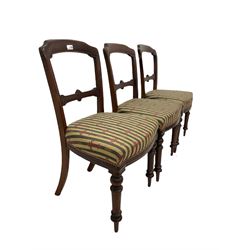 Set six Victorian mahogany dining chairs, the shaped cresting rail over carved rail back, seat upholstered in stripped fabric, raised on turned supports W47cm