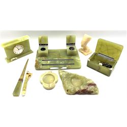 Onyx desk inkstand with two covered inkwells, onyx cigarette box, mantel clock, cigar cutter and other onyx items 