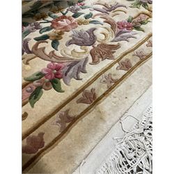 Chinese washed woollen embossed beige ground rug, with foliate design 325cm x 245