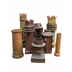 Eight salt glazed and other chimney pots of various forms, tallest height 122cm