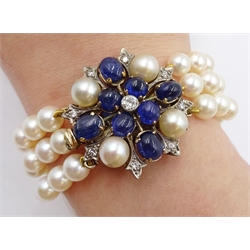  Three row cultured pearl bracelet, two spacers set with diamonds, on gold cabochon sapphire, diamond and pearl clasp   