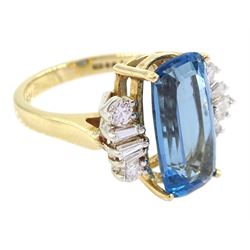 14ct gold blue topaz and diamond ring, the octagonal cut blue topaz, with five tapered baguette cut and round brilliant cut diamonds set either side, London import mark 1993