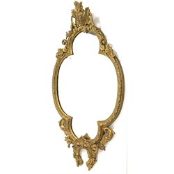 Early 20th century Rococo style gilt framed wall mirror decorated with scrolled foliage 