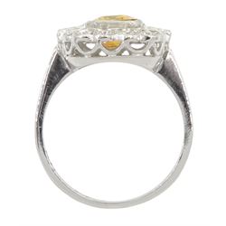 Platinum emerald cut yellow sapphire, round and baguette cut diamond cluster ring, stamped Plat, sapphire 2.30 carat, total diamond weight 0.80 carat, with Wold Gemological Institute Report