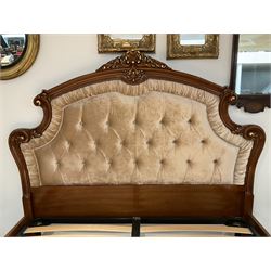 Barnini Oseo - super king 6' 'Reggenza' bedstead, the headboard with raised foliate pediment with central shell motif, scrolling and moulded frame with gilt detail, the headboard and footboard upholstered in pale buttoned fabric, raised on cabriole feet