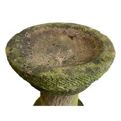 19th century three-piece tooled and weathered sandstone birdbath, shallow bowl with tooled exterior on cylindrical pedestal and circular base