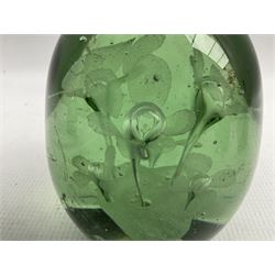 Victorian green glass dump paperweight with a flower pot inclusion H11cm, and three others of similar design (4)