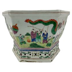 20th century Chinese hexagonal form jardiniere, the exterior enamelled with a procession of figures and musicians in a mountainous landscape, on pierced base, W27cm x H19cm. Provenance: From the Estate of the late Dowager Lady St Oswald