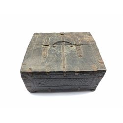 Indian wooden casket with hinged lid and carrying handle, metal banded with incised and carved decoration, W29cm x H15cm 