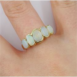 9ct gold five stone opal ring, hallmarked 