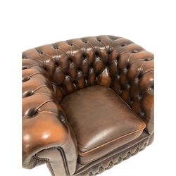 Chesterfield style armchair upholstered in brown deep buttoned leather 