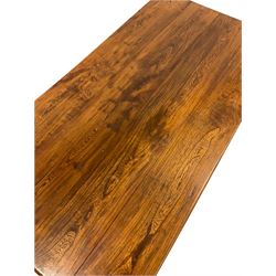 Elm dining table, the four plank rectangular top, raised on panel end supports untied by a stretcher  (W68cm, L130cm, H78cm)