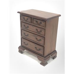 Ancient Mariner - miniature Georgian style mahogany chest, fitted with two short and three long drawers, raised on ogee bracket supports W