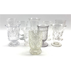  Collection of ten various glass celery vases and a pair of oil lamps with moulded glass reservoirs  