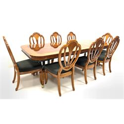 Late 20th century American walnut extending dining table, the lozenge inlayed, quarter sawn veneered and herringbone banded top with two additional leaves over ebonised cluster column uprights and triple splay supports with brass cup castors to each end, (258cm x 111cm, H78cm) together with a set of eight walnut dining chairs with upholstered seats (W55cm)