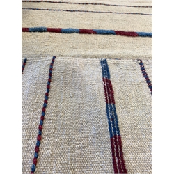 Flatweave yellow ground rug, decorated with lineal design
