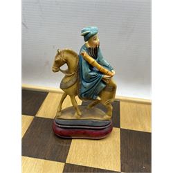 Chinese painted resin figural chess set, King H22cm (complete), with matched wooden chessboard