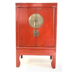 Late 19th century Chinese red lacquered Moon cabinet, two doors enclosing interior fitted with shelves and drawers, W111cm H177cm, D56cm