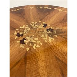 Mid-20th century circular breakfast table,  the circular top with marquetry inlay, raised on carved baluster base, leading into four splayed supports 