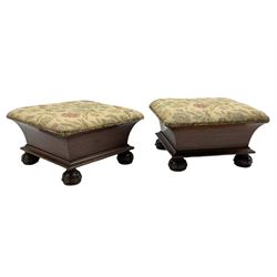 Pair early to mid-19th century mahogany footstools, square form with cavetto body and lowered mould, on turned and carved bun feet, upholstered in floral pattern fabric