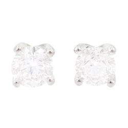 Pair of 18ct white gold round brilliant cut diamond stud earrings, total diamond weight approx 0.85 carat