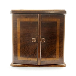  Late Victorian crossbanded rosewood table top cabinet fitted with three small drawers and enclosed by panelled doors on a plinth base 29cm x 28cm x 18cm