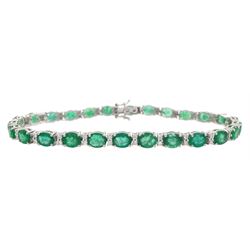 18ct white gold oval cut emerald and round brilliant cut diamond bracelet, stamped, total emerald weight approx 8.30 carat