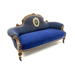 Victorian mahogany framed three seat sofa, scrolled serpentine cresting rail over swept arms, covered in blue fabric with a central needlework oval panel, raised on turned supports, all over box wood sting inlay, W170cm, H90cm, D72cm