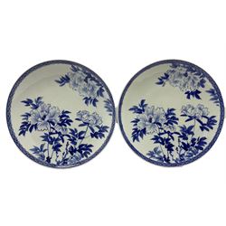 Pair of Japanese blue and white chargers decorated with chrysanthemum flowers and edged with geometric border D42.5cm, (2)
