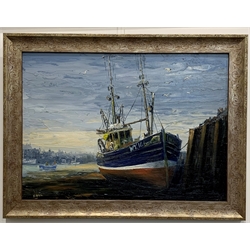 Jack Rigg (British 1927-): Whitby Harbour at low water, oil on board signed,  38cm x 52 ARR may apply to this lot