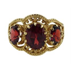 9ct gold three stone oval garnet ring, in an openwork setting, hallmarked