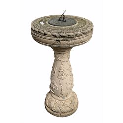 Sun dial on a composition baluster pedestal decorated with berries and vines H75cm