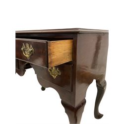 George III mahogany and pine-lined low-boy side table, the moulded top above one long frieze drawer and two short drawers around an arched apron, on cabriole legs with pointed pad feet
