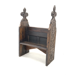  Victorian stained oak single seat pew, with profusely carved panel end supports, W88cm, H133cm, D41cm  