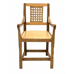 Peter 'Rabbitman' Heap of Wetwang - Yorkshire oak carver dining armchair, the lattice back over studded leather upholstered seat, raised on faceted octagonal supports united by stretchers, carved with Rabbit signature W53cm