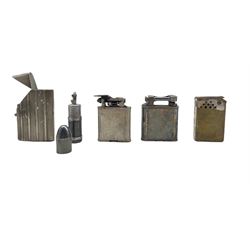 Dunhill 1930s lighter with lifting arm in silver plated case Pat.No. 390107 ,Reg. 737418, a Polo lighter, two others and a vesta case