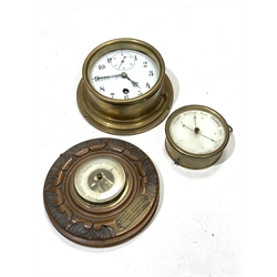 Early 20th century brass bulkhead clock, white enamel dial with Arabic chapter ring and subsidiary seconds hand, (D19cm) together with an early 20th century aneroid barometer in carved walnut case (D19cm) and a brass cased aneroid barometer (D11cm)