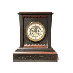 French - 8-day late 19th-century mantle clock in a Belgium slate case, with a flat top, rouge marble relief and incised chasing on a stepped plinth, two-part enamel dial with a visible dead-beat brocot escapement, Roman numerals, minute track and steel spade hands, two train movement striking the hours and half-hours on a bell. With pendulum.