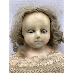 19th century wax and composite doll, wax head and limbs, inset sleeping glass eyes and blond ringlet hair, L58cm 