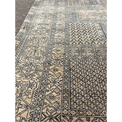 Tribal Hadklu design ground rug, with Mihrab motif enclosed by double guarded border, (125cm x 210cm)