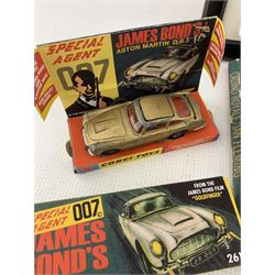 Corgi Toys James Bond Aston Martin D.B.5 No.261, boxed, Corgi BMW 750i from 'Tomorrow Never Dies', boxed, photograph of George Lazenby and two James Bond paperback books (5)