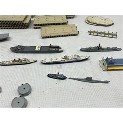 Tri-ang Minic ships H.M.S. Centaur, boxed, Vikingen, boxed, Royal Yacht Britannia, four others, quay sections, breakwaters, pier building etc 