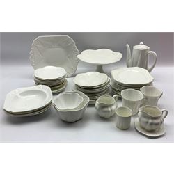 Collection of Shelley white Dainty tea and coffee ware including cups, saucers and mugs, cake stand, serving bowl, bread and butter plate, coffee pot, cream jugs, sugar bowls etc (52)