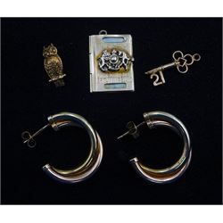 Pair of gold hoop earrings and three gold pendant/charms including owl, passport and 21 key, all hallmarked 9ct