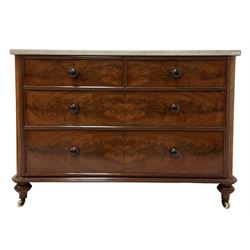 Victorian mahogany wash stand, the marble top over two short and two long drawers, raised on ceramic castors 