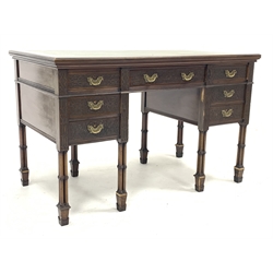 Edwards and Roberts - Edwardian Chippendale revival kneehole desk, moulded rectangular top with leather inset, the front decorated with blind fret work, seven drawers each with 'Cope & Collinson' stamped locks, cluster column supports with spade feet, the centre drawer stamped 'Edwards & Roberts', W122cm, H76cm, D66cm