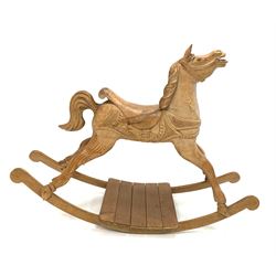20th century Irish carved pine rocking horse, L149cm