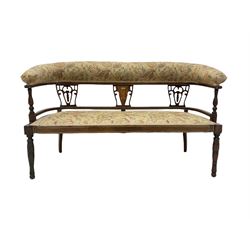 Late Victorian mahogany sofa, the upholstered cresting rail and inlaid back rail over upholstered seat raised on turned supports 