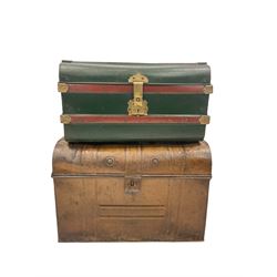 Early 20th century tin dome top steamer trunk, finished in green and red bands, with carry handle to each end, together with another trunk 