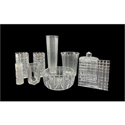 Heavy cut glass cylindrical jar and cover H24cm, pair of Polish glass square section cut glass vases, a mid century faceted glass vase unmarked, together with other similar glass